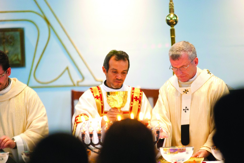 Newly ordained Deacon Victor Lujano assists Archbishop Timothy Costelloe SDB at the Mass at St Gerard Majella Parish on July 27. PHOTO: Robert hiini