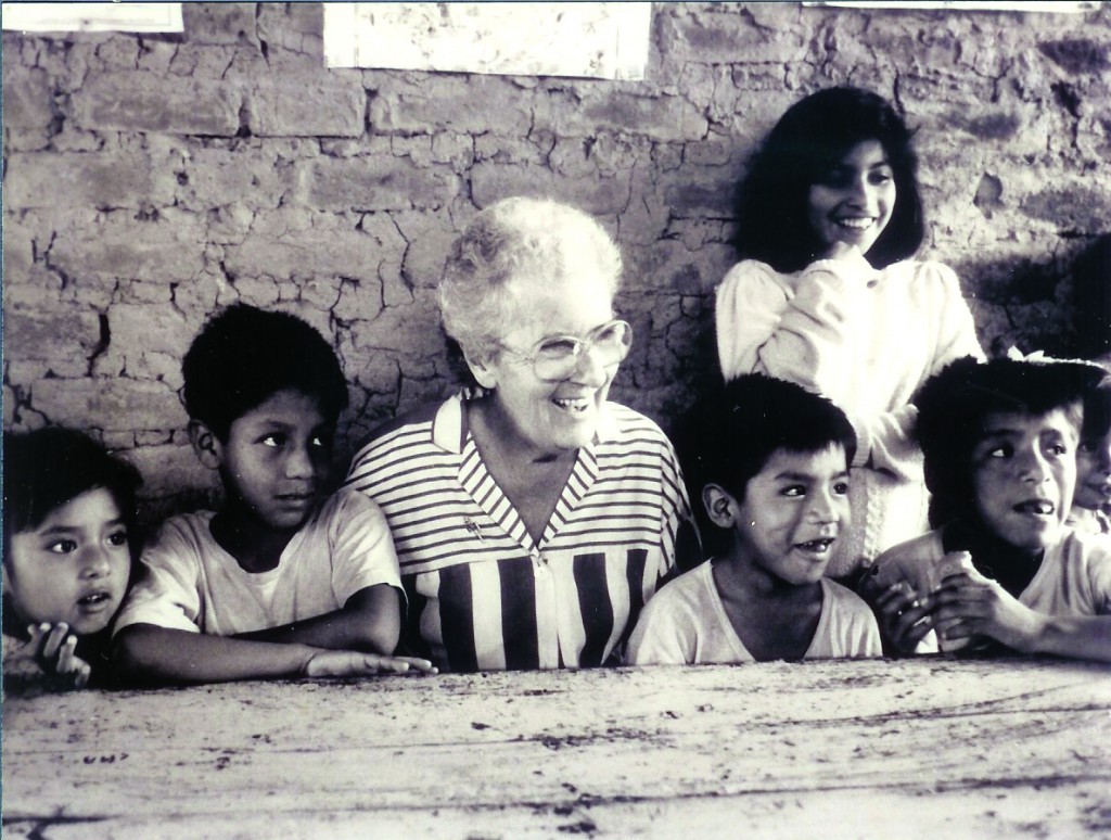 Josephite Sister Elizabeth Murphy with children of Peru. After serving as superior of her order and as head of the-then Council of National Superiors General, she sought permission to work as a missionary in Peru. PHOTO: Courtesy Josephite Sisters