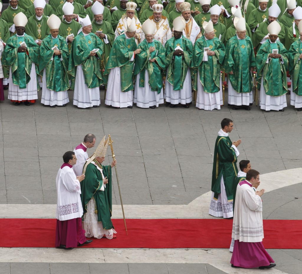 Pope Benedict XVI carries his pastoral staff as he leaves after celebrating the opening Mass of the Synod of Bishops on the new evangelization in St. Peter's Square at the Vatican Oct. 7. 