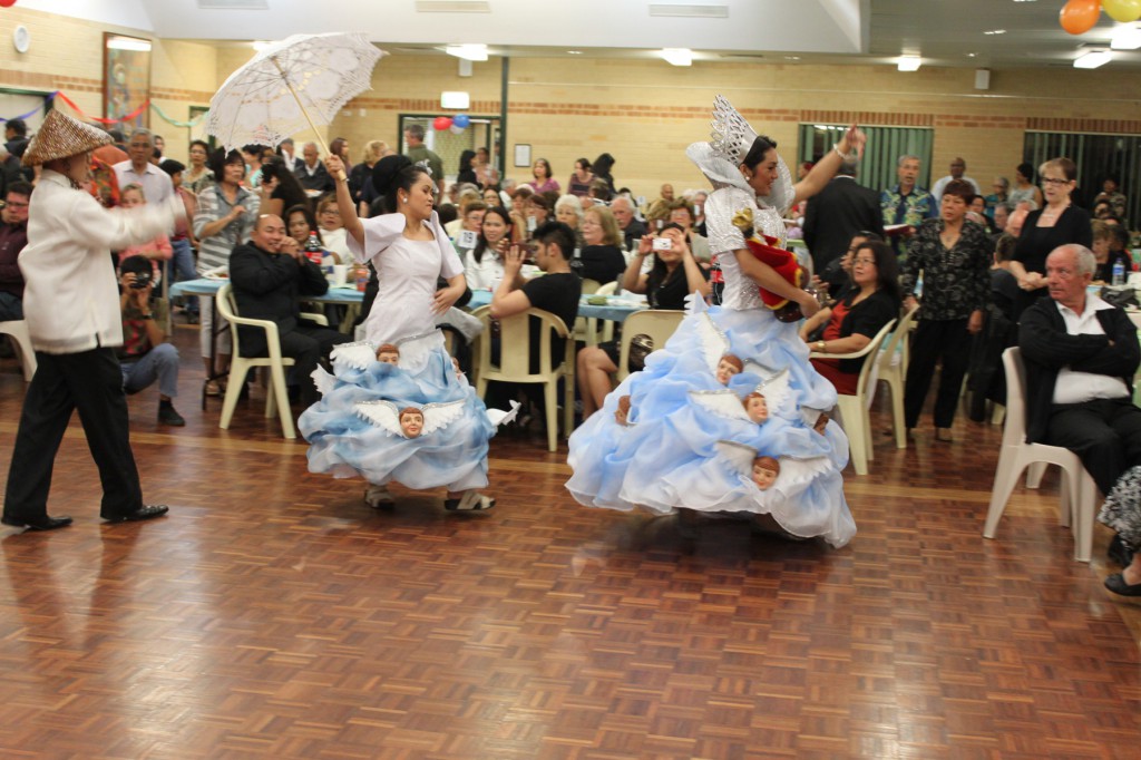 Sinulog dancers entertain Maida Vale parishioners at their dinner dance for the Feast of parish patron St Francis of Assissi.