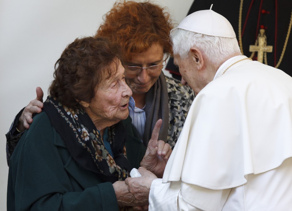 Pope Benedict XVI talks with Enrichetta Vitali, 91, during a visit Nov. 12 to a home for the elderly run by the Sant'Egidio Community in Rome. PHOTO: CNS/Paul Haring 