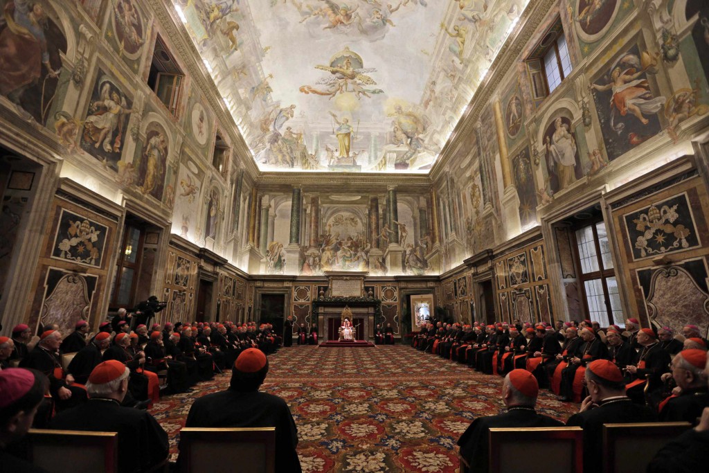 Pope Benedict XVI meets with members of the Roman Curia to exchange Christmas wishes Dec. 21 In Clementine Hall at the Vatican. PHOTO: CNS/Reuters via pool