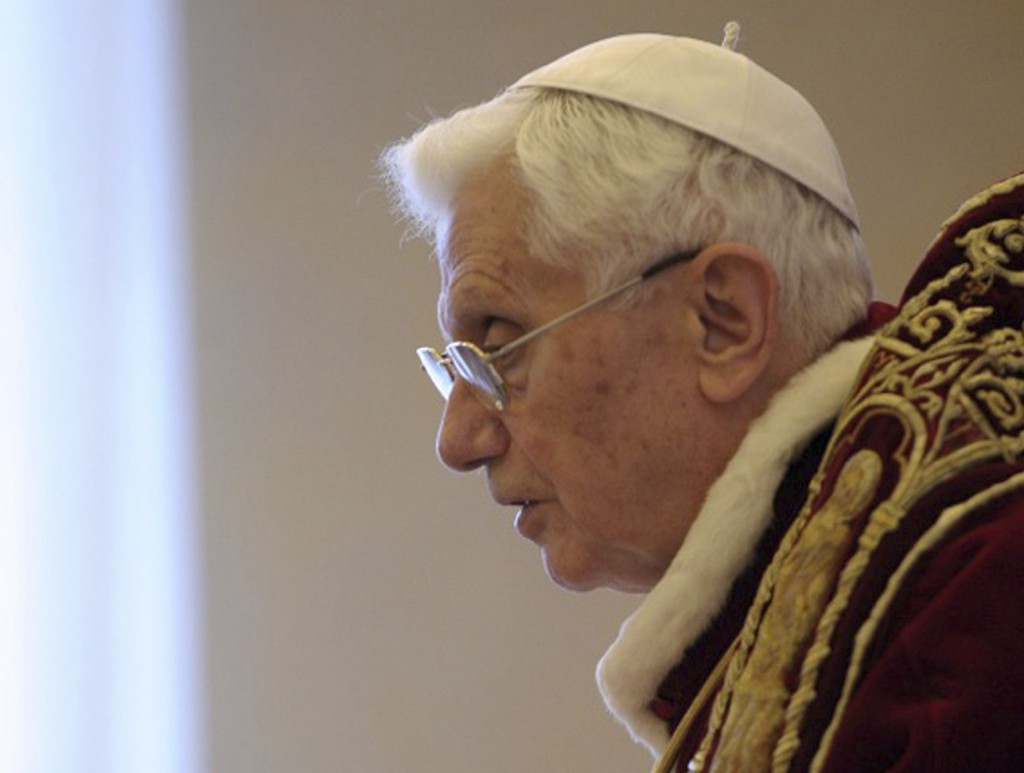 Pope Benedict XVI attends a Feb. 11 meeting with cardinals at the Vatican announcing he will resign at the end of the month. PHOTO: CNS/L'Osservatore Romano via Reuters