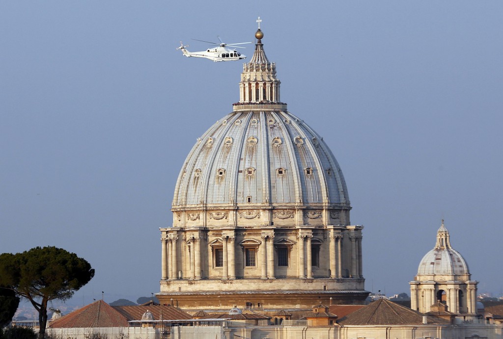 A helicopter carrying Pope Benedict XVI takes off from inside the Vatican on its way to the to the papal summer residence at Castel Gandolfo, Italy, Feb. 28, the final day of his papacy. PHOTO: CNS/Stefano Rellandini, Reuters