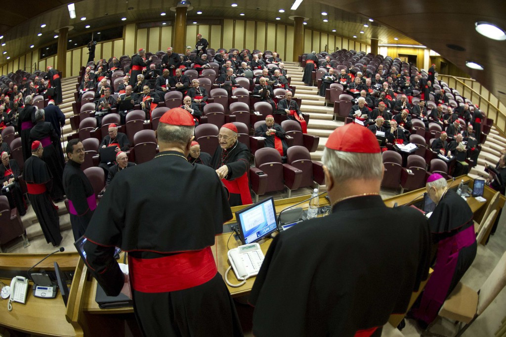 Cardinals attend a meeting at the synod hall in the Vatican on March 4, where Preparations for electing a new pope began as the College of Cardinals met. PHOTO: CNS/L'Osservatore Romano via Reuters