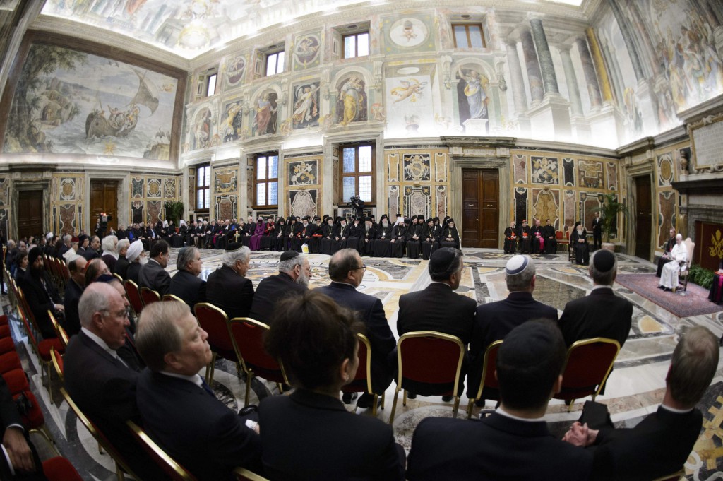 Pope Francis leads a meeting with religious leaders at the Vatican on March 20 where the pope met with the Christian, Jewish, Muslim, Buddhist, Hindu, Sikh and Jain delegations that had come to the Vatican for his inauguration. PHOTO: CNS/L'Osservatore Romano via Reuters