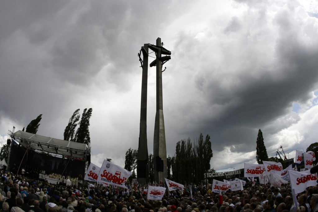 People attend Mass at the shipyard workers' monument in front of the shipyard in Gdansk, Poland. PHOTO: CNS/Peter Andrews, Reuters