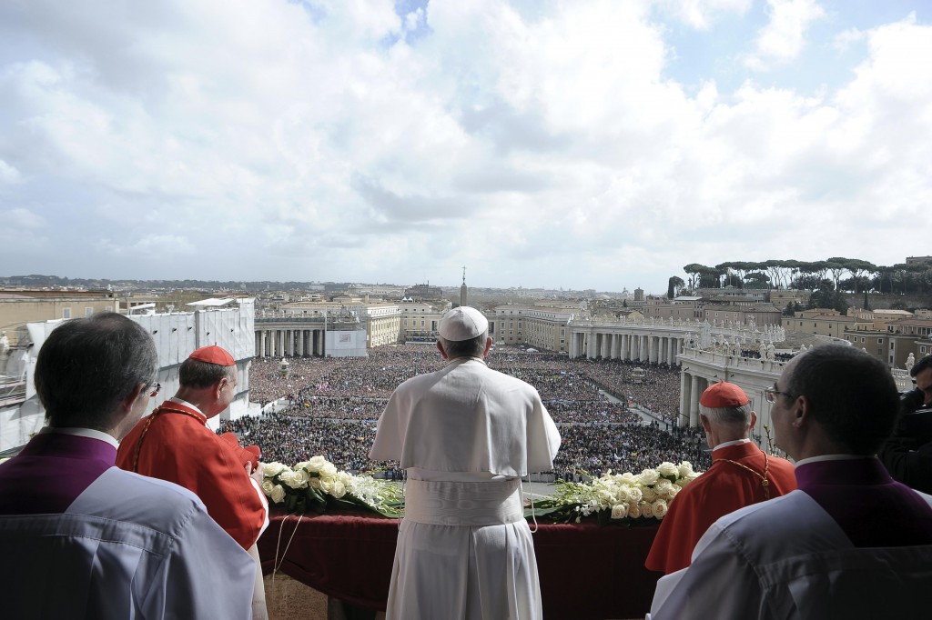 Pope Francis delivers his Easter blessing "urbi et orbi" (to the city and the world) from the central balcony of St. Peter's Basilica on March 31 at the Vatican. PHOTO: CNS/L'Osservatore Romano via Reuters