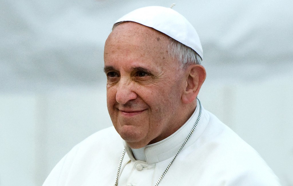 Pope Francis greets the crowd during a Pentecost prayer vigil in St. Peter's Square on May 18 at the Vatican. PHOTO: CNS/Alessia Giuliani, Catholic Press Photo