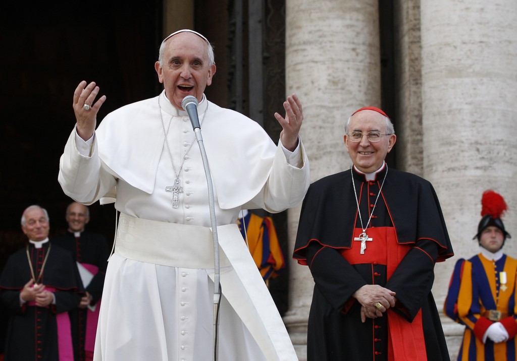 Pope Francis stands next to Cardinal Agostino Vallini, the papal vicar for Rome, as he addresses the crowd outside the Basilica of St. Mary Major in Rome. PHOTO: CNS/Paul Haring