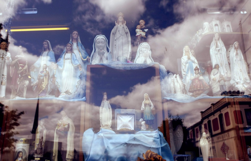 Religious statues are displayed in a shop in Knock, Ireland. PHOTO: CNS/Cathal McNaughton, Reuters