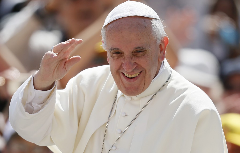 Pope Francis waves as he arrives to lead his general audience on June 26 in St. Peter's Square at the Vatican. PHOTO: CNS/Paul Haring