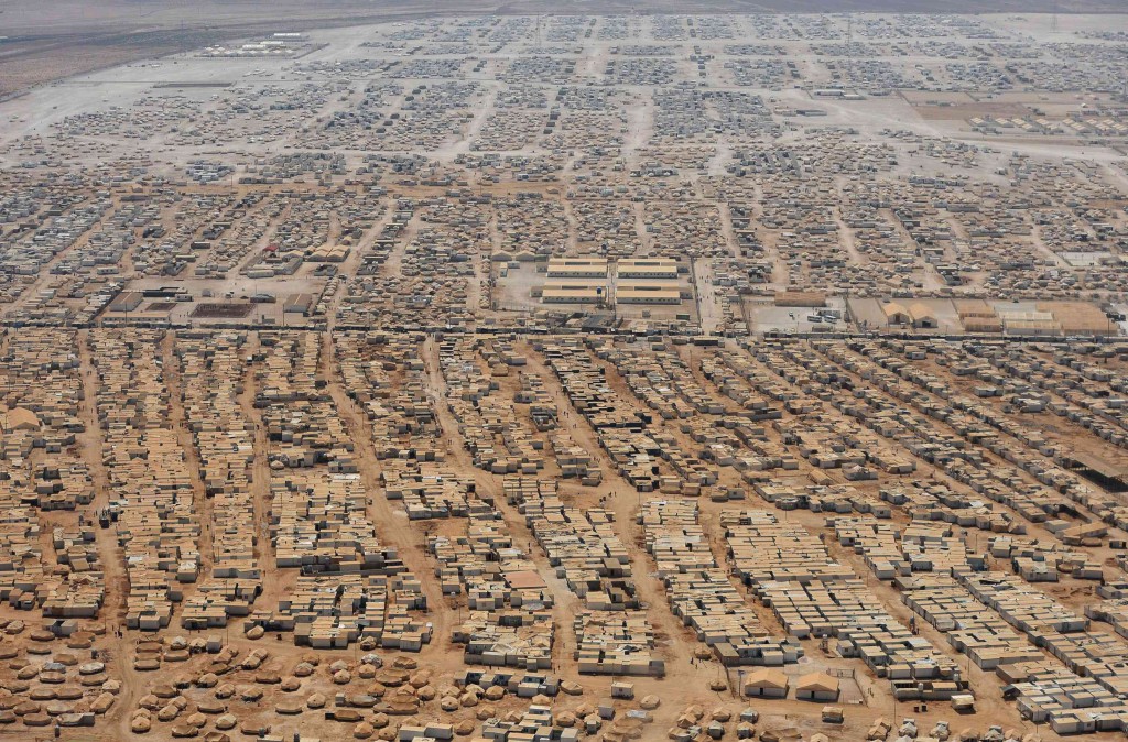 An aerial view shows the Zaatari refugee camp outside Mafraq, Jordan, July 18. The camp holds roughly 115,000 Syrians who have fled from war. PHOTO: CNS/Reuters