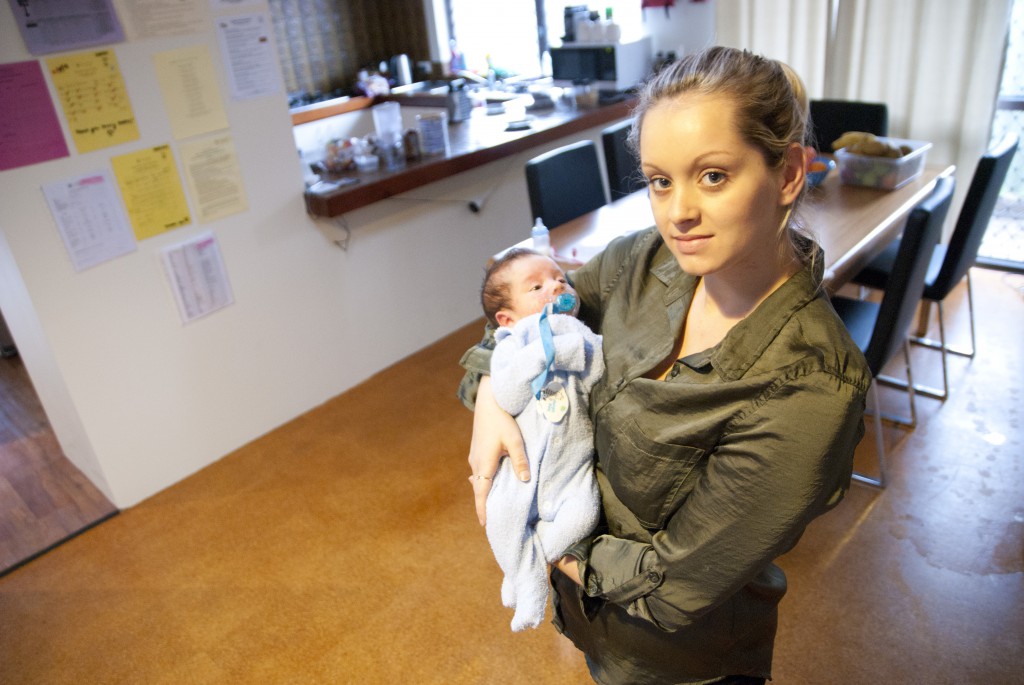 Young mother Chrissy cradles her son Brayden at Horizon House in Dianella. Horizon House, a residence for homeless mothers, has won a national award for the social services it offers. PHOTO: Robert Hiini 