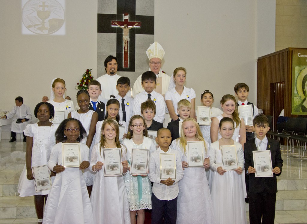 There were 20 First Holy Communicants at the special June 2 celebration which was attended by friends and parishioners past and present. PHOTO: Willie Thow 