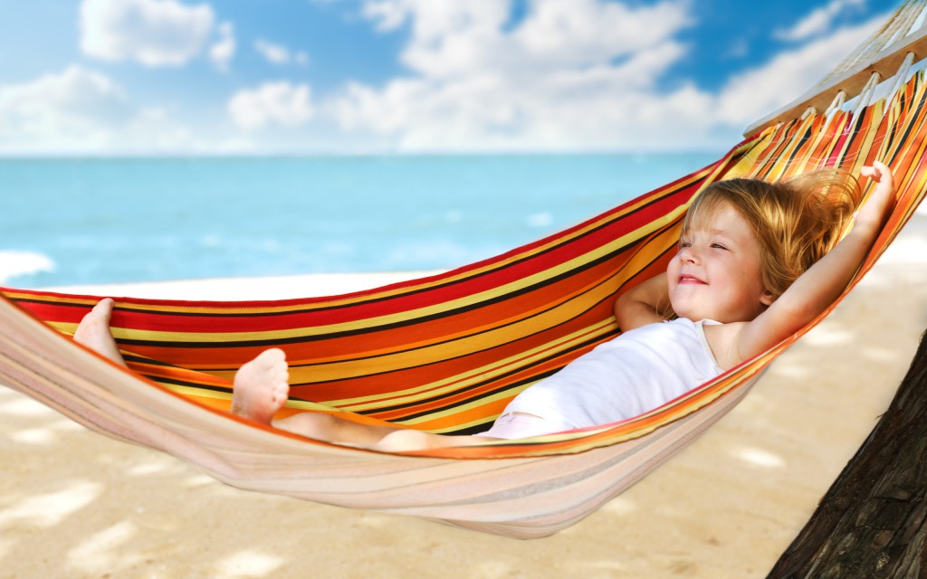 child relaxing in a hammock