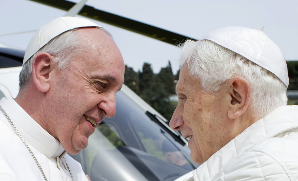 Pope Francis greets retired Pope Benedict XVI in late March at the papal summer residence in Castel Gandolfo, Italy. Both popes have called on Catholics to swim against the tide. PHOTO: CNS/L'Osservatore Romano via Reuters