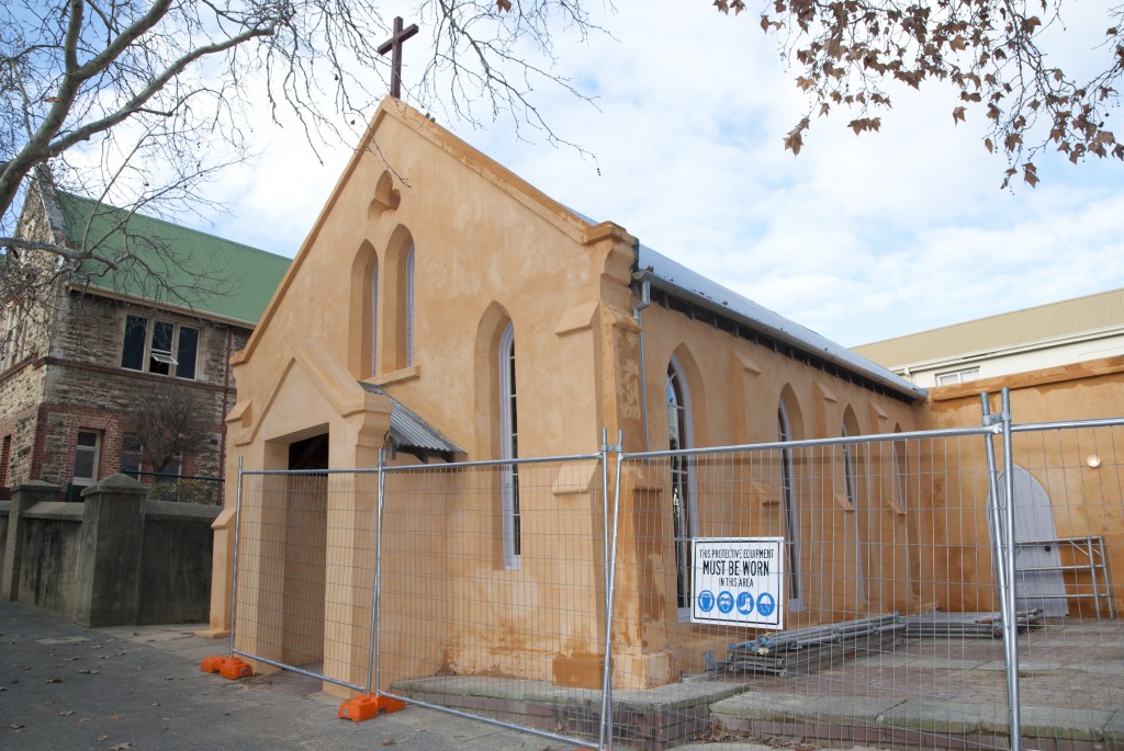 St John’s Pro-Cathedral almost completely restored to its original condition, including the freshly painted rust-coloured exterior. The small building on Victoria Avenue was the first Catholic church in Perth. Mercedes College can be seen in the background. PHOTO: MATTHEW BIDDLE