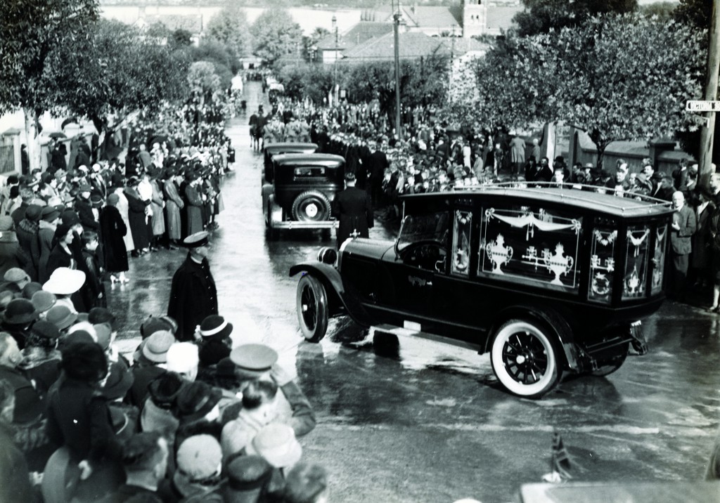 With the Swan River visible in the distance, a policeman wearing a cape to protect against the rainy weather watches the hearse carrying the body of Archbishop Clune leave Victoria Square headed for Karrakatta Cemetary in May 1935. Thousands packed the streets of Perth for the occasion. In an historic moment, Archbishop Clune’s remains will be interred in the Crypt of St Mary’s Cathedral at 7pm on September 3, bringing the remains of all of Perth’s former reigning bishops and archbishops together for the first time. The Archdiocese is keen for as many Catholics as possible to be present. PHOTO: Courtesy of Fr Robert Cross