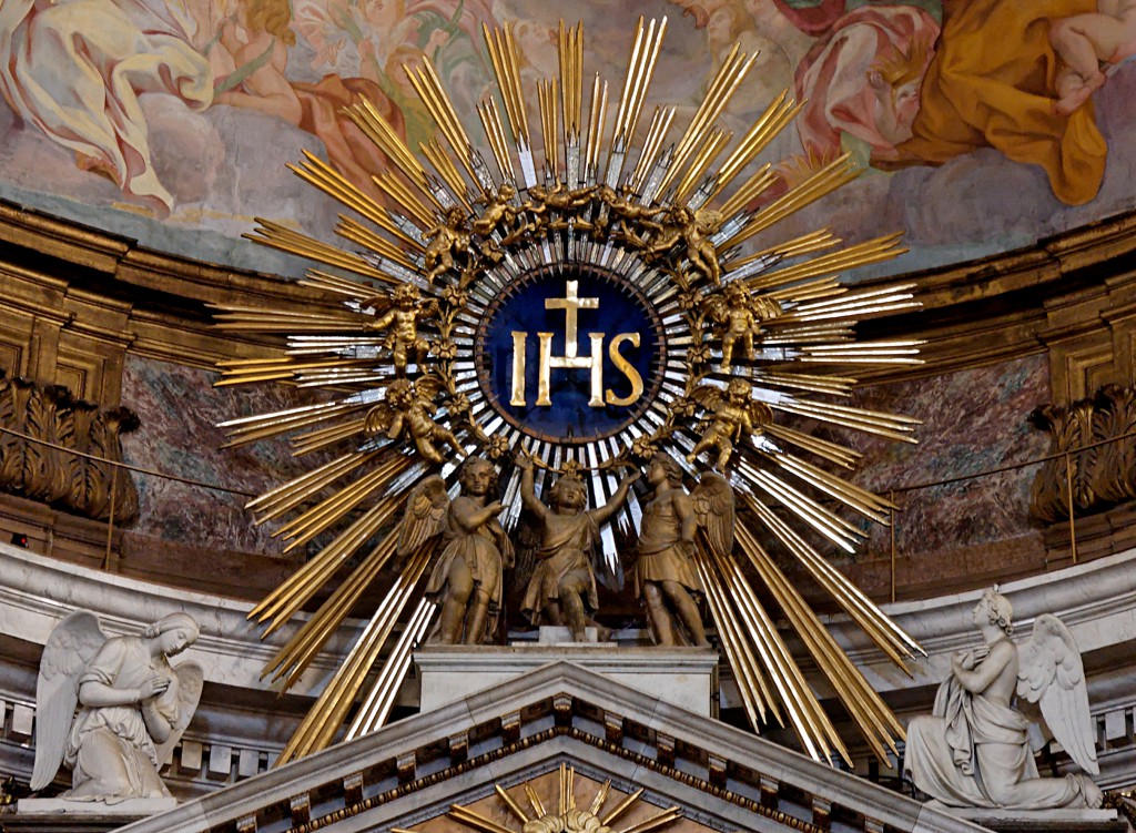 HS monogram, on top of the main altar of the Gesù, Rome, Italy.