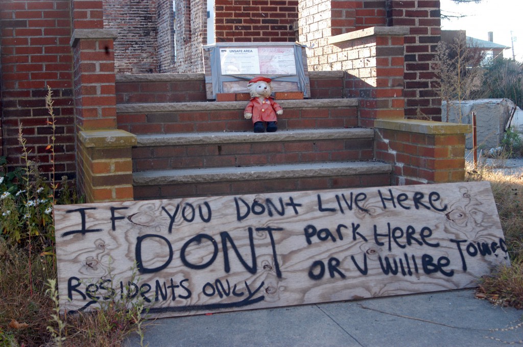 Just footsteps away from St. Francis de Sales School in the Belle Harbor neighborhood of the New York borough of Queens stands this empty shell of a home Oct. 26 that was destroyed by the fires brought on by Hurricane Sandy one year ago. PHOTO: CNS/Marie Elena Giossi, The Tablet