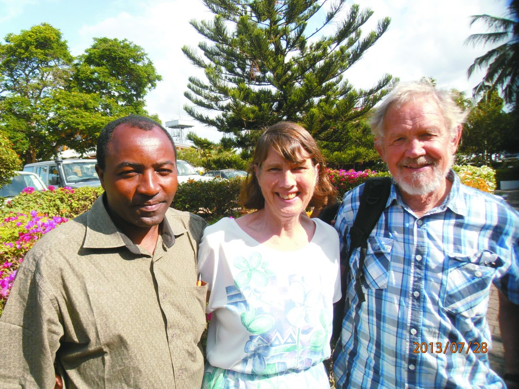 Fr Melodious Mlowe, at left, with Perth couple Bronwyn and Les Mutton during their July visit to Tanzania. PHOTO: SUPPLIED