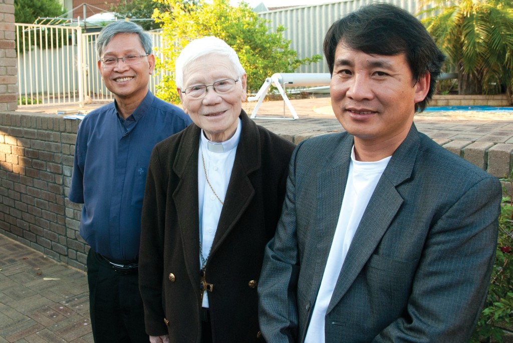 Bishop Paul Cao Dinh Thuyen, centre, the retired bishop of Vinh diocese in central Vietnam, says indefinite imprisonment awaits many Vietnamese asylum seekers whose claims are rejected. Bishop Paul, pictured with Vietnamese Catholic Community Chaplain, Fr Huynh Nguyen, left, and Fr Dinh Van Quynh, urged the immigration department to accept the claims of 26 detainees in Northam. PHOTO: ROBERT HIINI