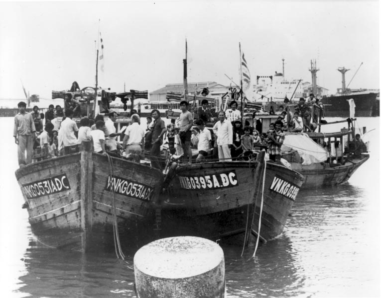 Vietnamese boat people in Darwin Harbour aboard several small wooden fishing vessels which brought 259 Vietnamese to Australian in one week in November 1977. PHOTO: National Archives of Australia