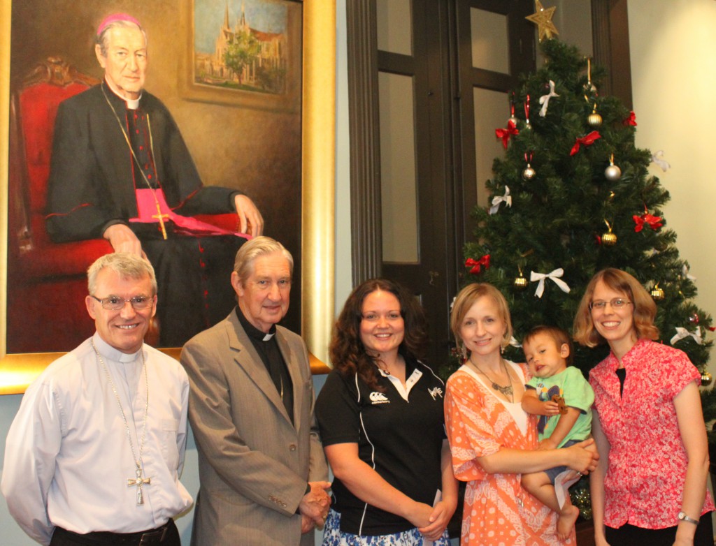 Archbishop Timothy Costelloe SDB, far left, Archbishop Emeritus Barry Hickey and the Biblical Foundation’s Co-Ordinator Dr Michelle Jones, far right, with scholarship recipients Vicky Burrows, centre, and Hayley Doan and her son, James. PHOTO: Courtesy of Fr Robert Cross