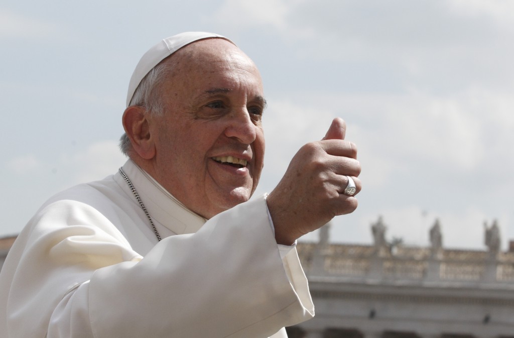 Pope Francis gives a thumbs up on April 2 as he leaves his general audience in St. Peter's Square at the Vatican. PHOTO: CNS/Paul Haring