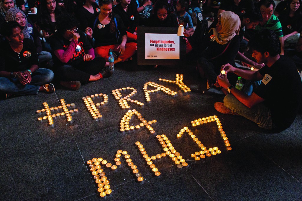 Malaysian youths gather in Petaling Jaya, Malaysia, on July 18 for a candlelight vigil for passengers and crew of the Malaysian Airlines flight MH17. In his homily at St Mary’s Cathedral on July 20, Perth Archbishop Timothy Costelloe last weekend spoke of the terrible act of violence in Ukraine which has cost so many lives and horrified the world. PHOTO: NS / Azhar Rahim, EPA