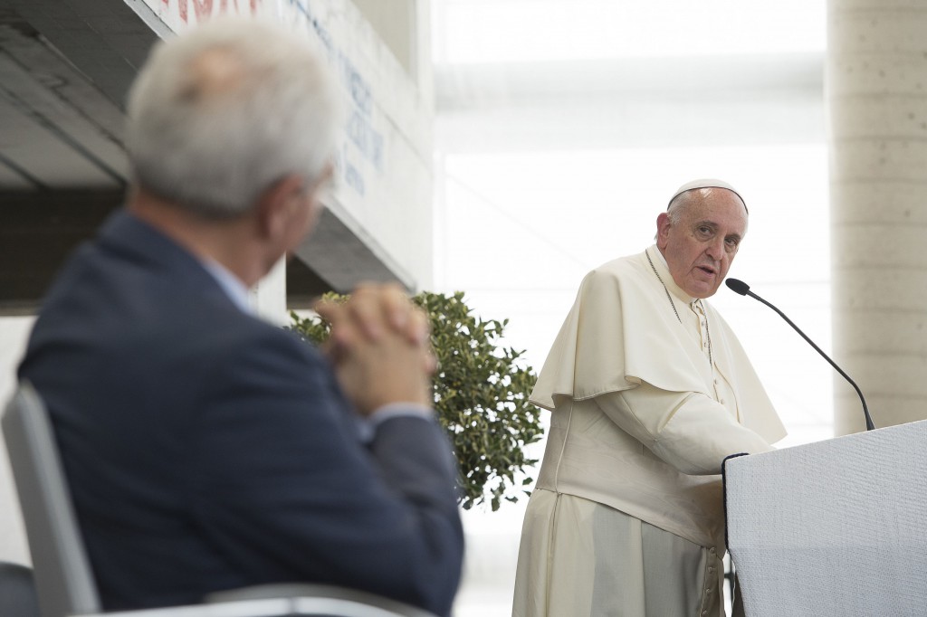 Pope Francis talks with Giovanni Traettino, a Protestant pastor and his friend, in Caserta, Italy, July 28. Pope Francis said he knew people would be shocked that he would make such a trip outside of Rome to visit a group of Pentecostals, but I went to visit my friends. PHOTO: CNS/ L'Osservatore Romano via Reuters