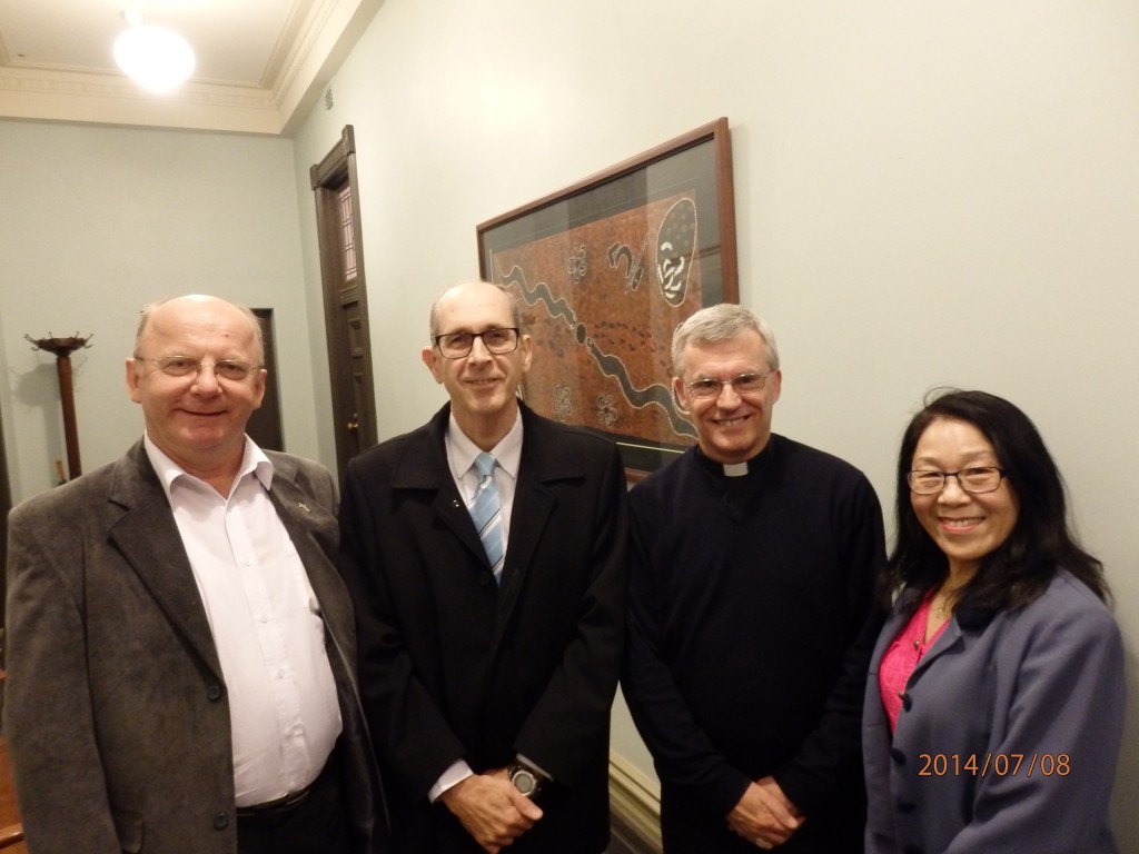 Fr Emil Ciecierega SDS, far left, together with Max and Annie Mayes, met Archbishop Timothy Costelloe SDB recently. PHOTO: SUPPLIED