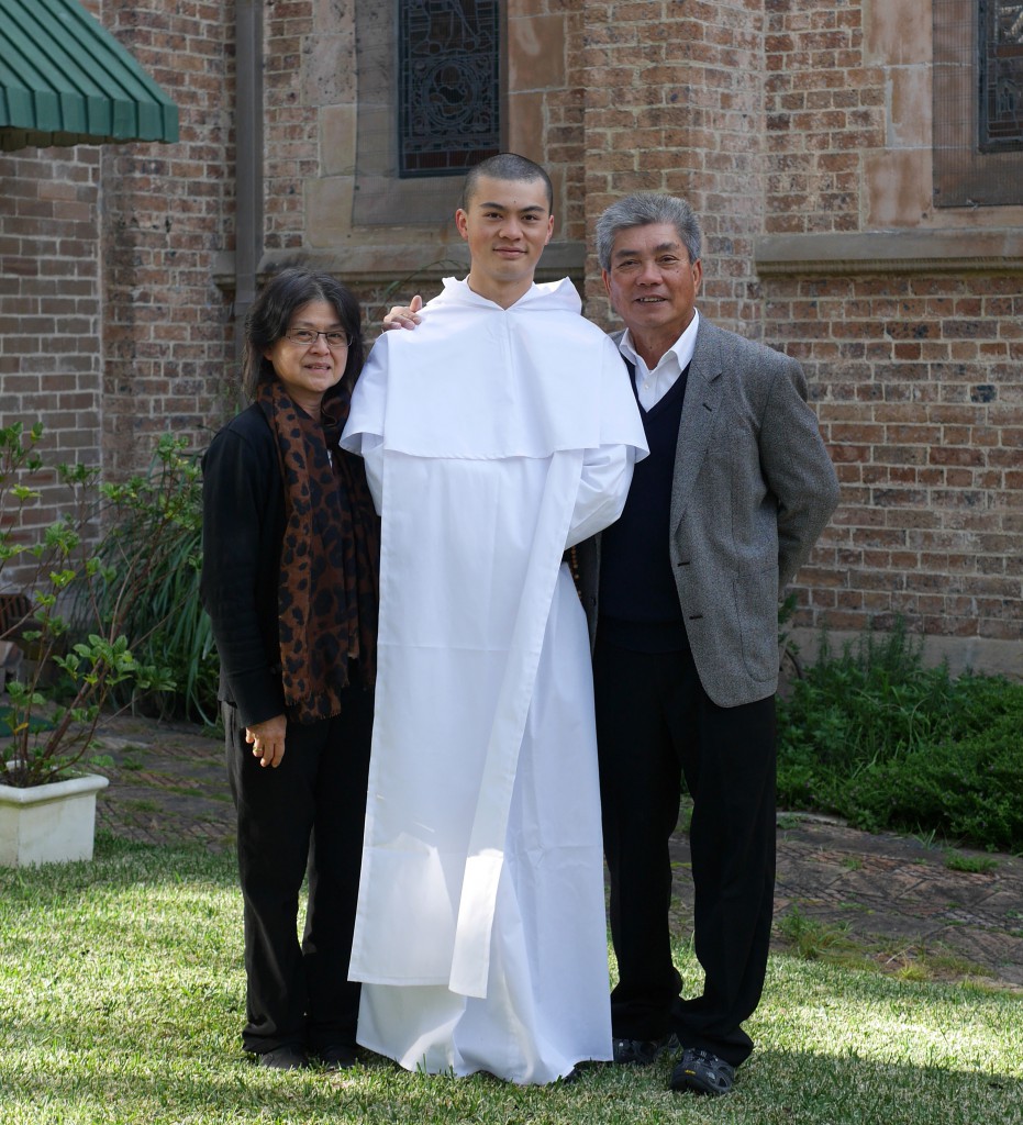 Br Reginald Mary with his parents after receiving the habit and religious name on June 27. PHOTO: SUPPLIED