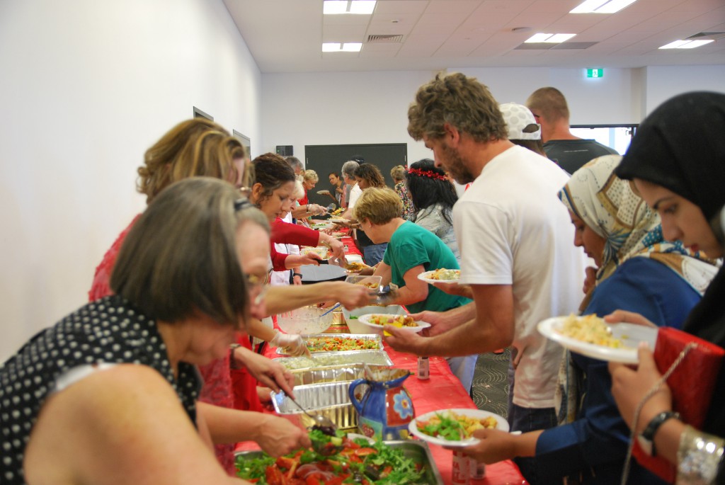 A crowd of more than 400 visitors filled The Rise recreation centre in Maylands on Saturday, 13 December for the 2014 Shopfront Christmas party. PHOTO: Marco Ceccarelli