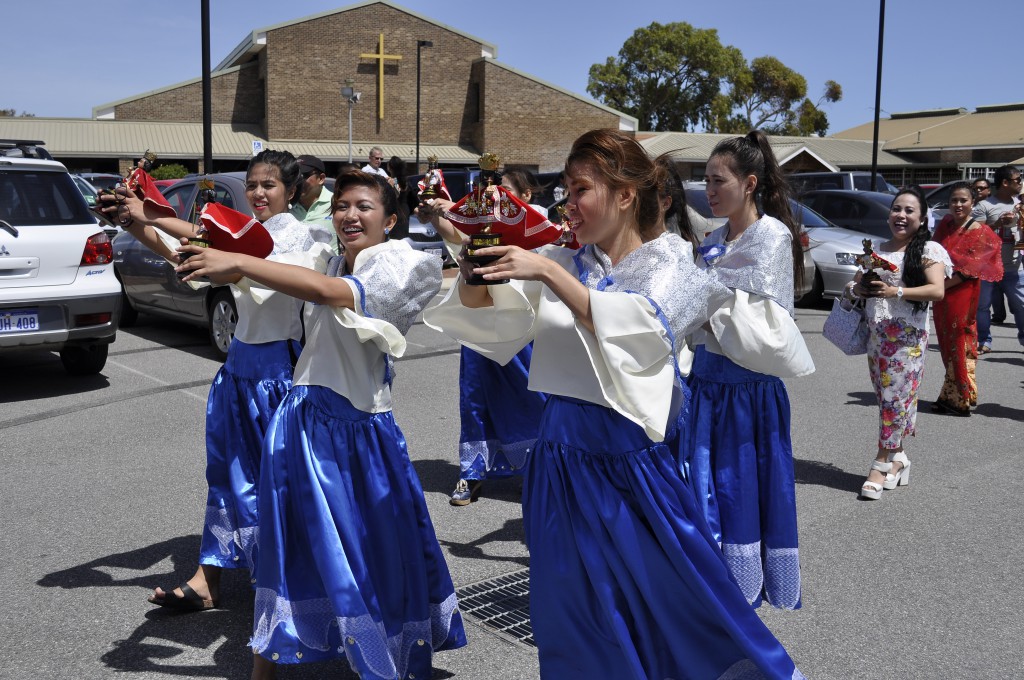 “Sinulog”, the Filipino traditional prayer dance, was the highlight of the procession of the Feast of Santo Nino (Holy Infant Jesus) at Our Lady of Lourdes Parish, Rockingham.             PHOTO: Supplied