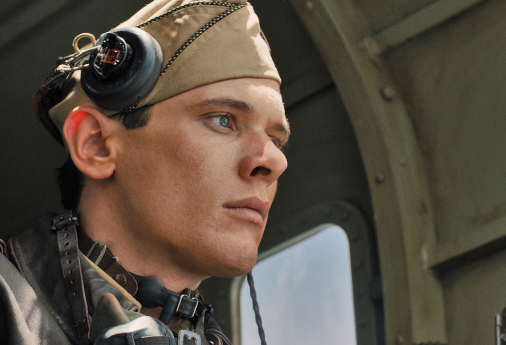Jack O'Connell stars in a scene from the movie "Unbroken." The Catholic News Service classification is A-III -- adults. The Motion Picture Association of America rating is PG-13 -- parents strongly cautioned. Some material may be inappropriate for childr en under 13. PHOTO: CNS/Universal