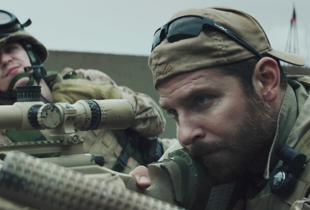 Kyle Gallner and Bradley Cooper star in a scene from the movie "American Sniper." The Catholic News Service classification is A-III -- adults. The Motion Picture Association of America rating is R -- restricted. Under 17 requires accompanying parent or adult guardian. PHOTO: CNS/Warner Bros