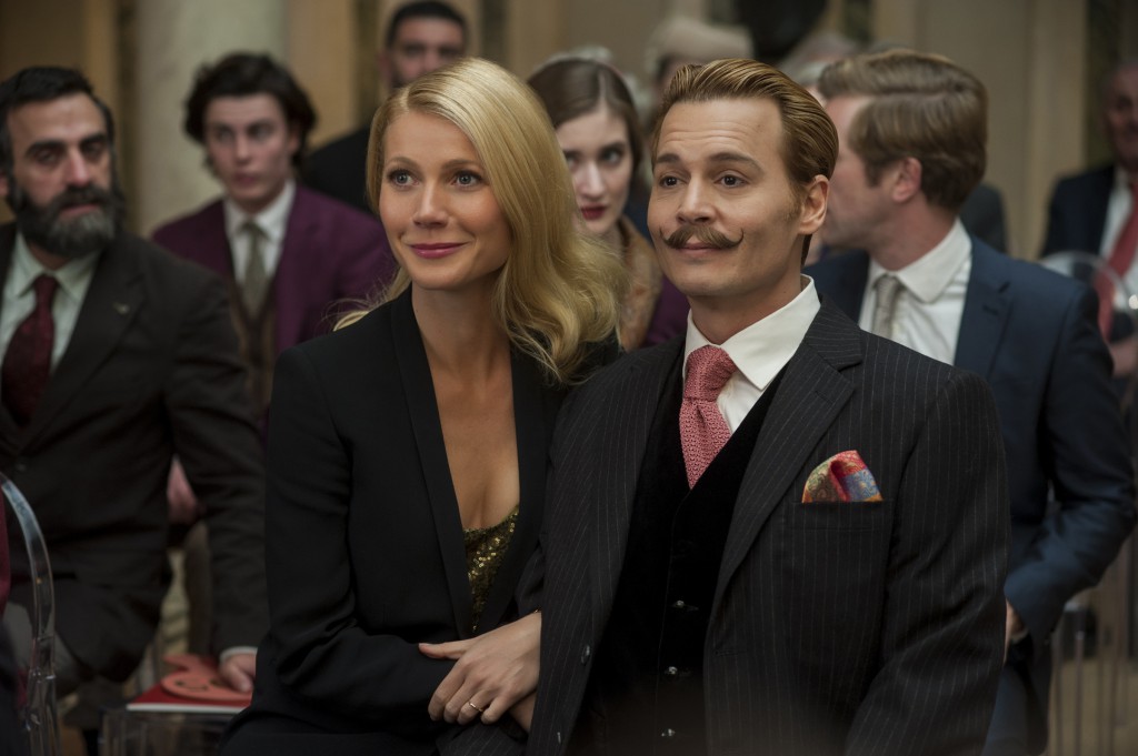 Gywneth Paltrow and Johnny Depp star in a scene from the movie "Mortdecai." The Catholic News Service classification is A-III -- adults. The Motion Picture Association of America rating is R -- restricted. Under 17 requires accompanying parent or adult guardian. PHOTO: CNS/Lionsgate