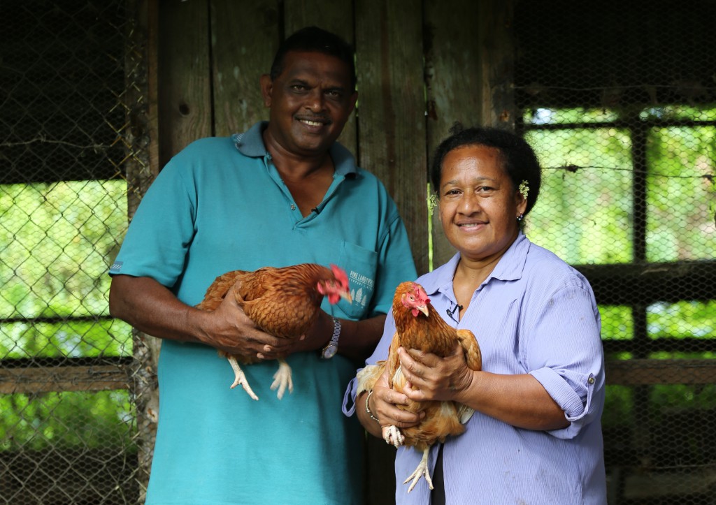 Supported by Caritas Australia, Eric and Ma are pictured outside their chicken coop. PHOTO: Andrew Garrick & Drew Morrison