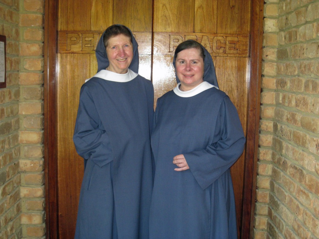 Sr Therese and Sr Maureen Therese, Benedictine nuns, stand in front of the Jamberoo Abbey church door. PHOTO: Debra Vermeer