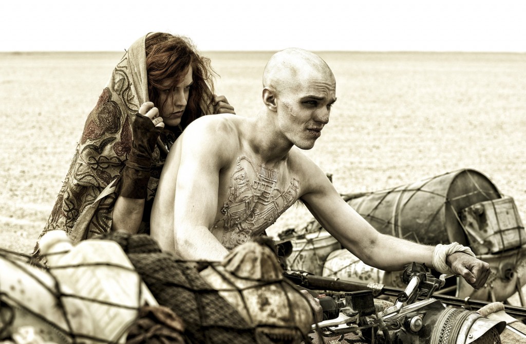 Riley Keough and Nicholas Hoult star in a scene from the movie "Mad Max: Fury Road." The Catholic News Service classification is L - limited adult audience, films whose problematic content many adults would find troubling. The Motion Picture Association of America rating is R - restricted. Under 17 requires accompanying parent or adult guardian. PHOTO: CNS/Jasin Boland, Warner Bros