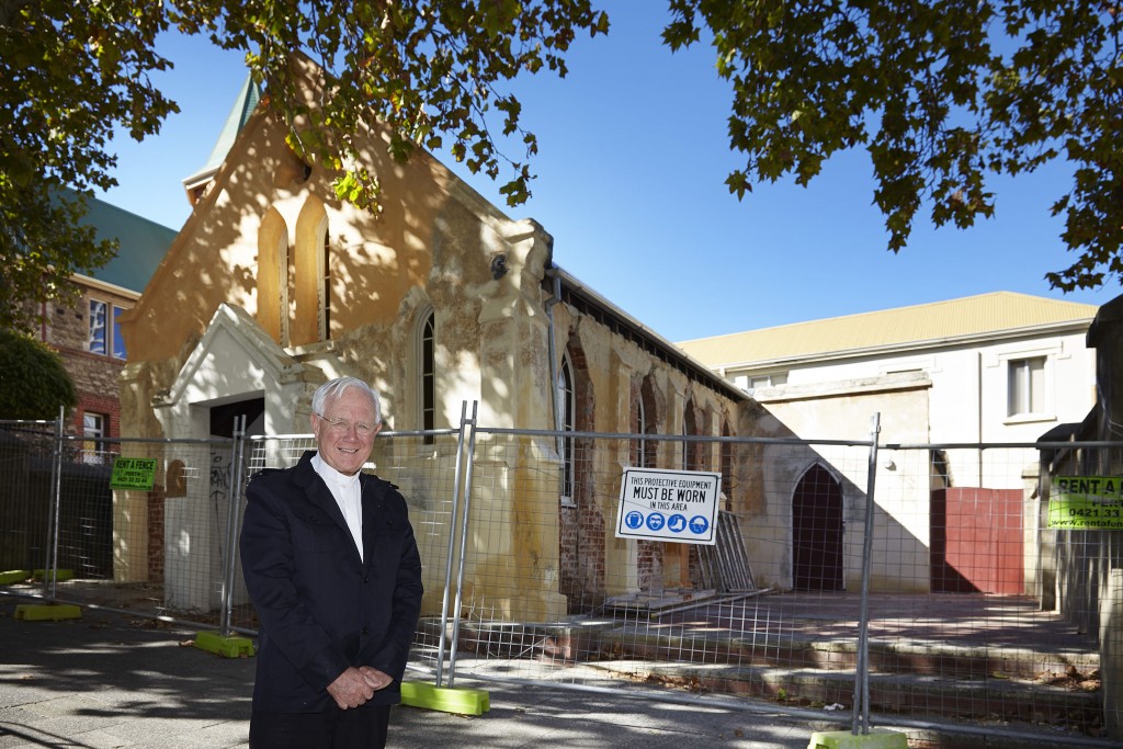 Dean of St Mary’s Cathedral observes the restoration work at St John’s Pro Cathedral. Archbishop Timothy Costelloe said he is delighted that this important and unique building, the first Catholic church in Western Australia, will soon re-emerge - a much loved icon of our city, ready to again serve as a ‘working church’ for the people of Perth. PHOTO: Ron Tan Photography