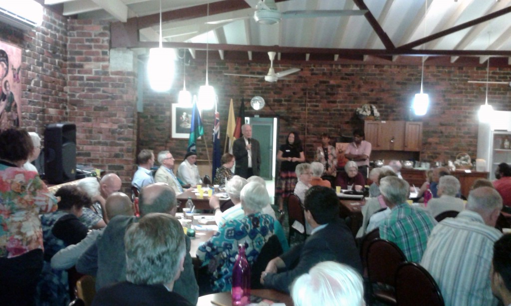 Perth Auxiliary Bishop Don Sproxton gives the final blessing at the conclusion of the colloquium co-ordinated by several agencies and organisations from the Archdiocese of Perth and government bodies. PHOTO: Supplied