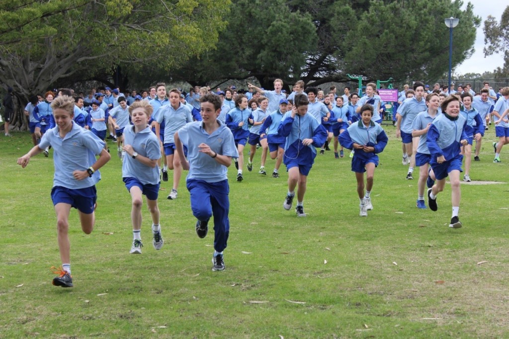 Students from Trinity College launch themselves into their Annual College Fun Run for India. PHOTO: Supplied