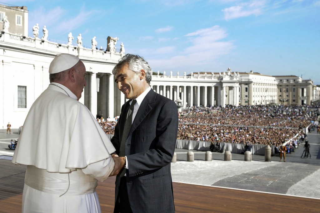 Pope Francis shakes hands with Tito Boeri, president of Italy's National Institute of Social Welfare, during an audience with members of the Italian National Social Security Institute in St Peter's Square at the Vatican on 7 November. The institute oversees the government's disability and pension structure. Photo: CNS