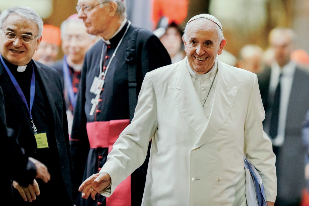 Pope Francis waves as he leaves the final session of the Synod of Bishops on the Ffamily at the Vatican. Photo: CNS/Paul Haring