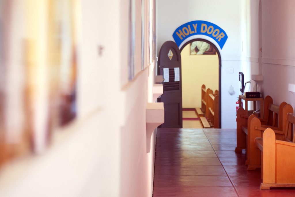 The passage leading to the Holy Door at the Carmelite Monastery’s chapel in Nedlands has been adorned with mercy-themed images and quotations, in order to enrich the experience of pilgrims. Photo: Rachel Curry