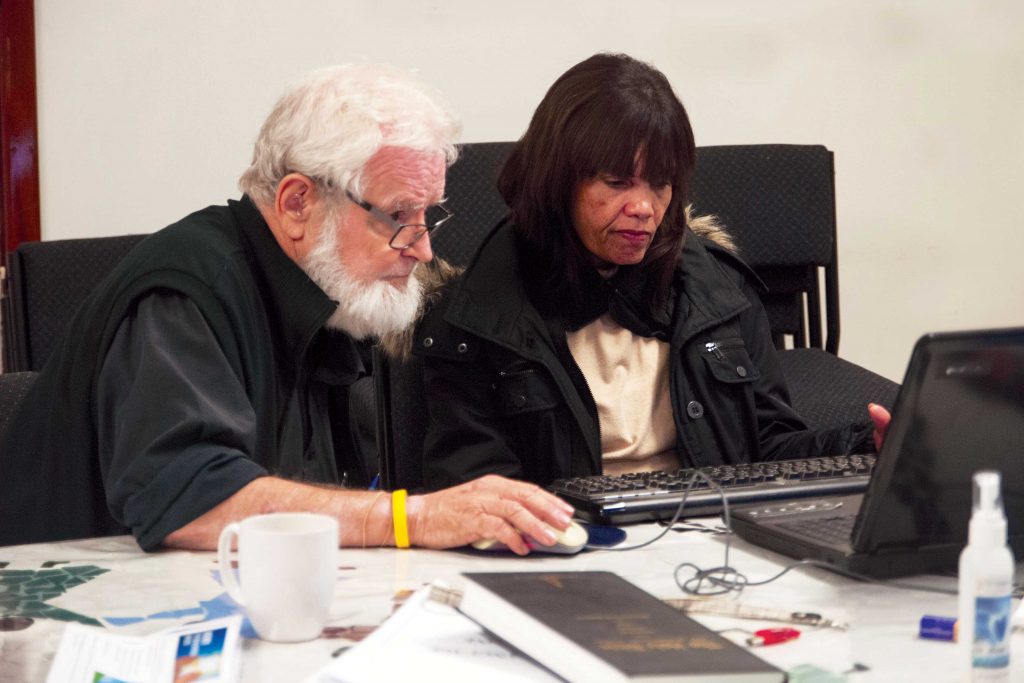 Fr Paul Pitzen from the Emmanuel Centre, tests the new perthcatholic.org.au website with Marie, who has been legally blind since birth. The new Archdiocesan site, which was launched in August 2015, has been developed to encourage those who are blind, deaf and/or hard of hearing to engage with the Archdiocese at a whole new level. Photo: Mat De Sousa