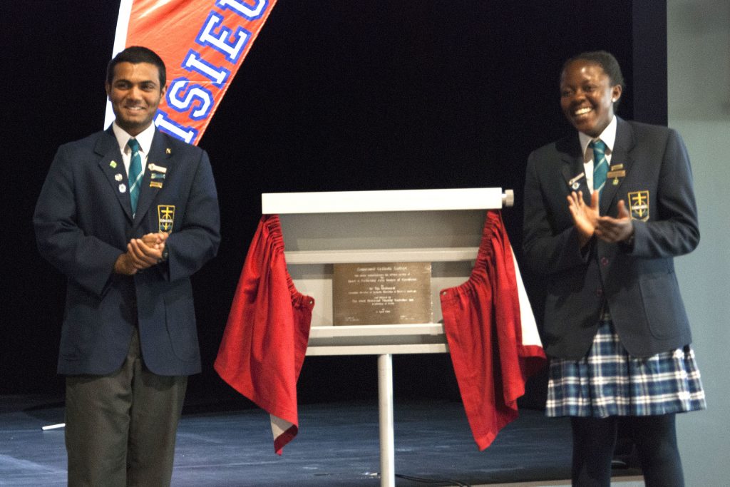 Emmanuel College Captains Atidaishe Mugwara and Antonio Joboy unveil the plaque for the opening of the new Sport and Performing Arts Centre at Emmanuel College on Wednesday 6 April. Photo: Jamie O’Brien.